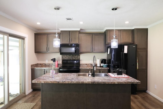 480 Woody Rd Unit 0, Jayess, MS 39641 - kitchen with black appliances, dark wood finished floors, ornamental molding, a kitchen island with sink, and decorative light fixtures