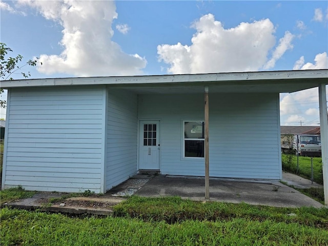 2365 N Tonti St, New Orleans, LA 70117 - back of property featuring a patio area