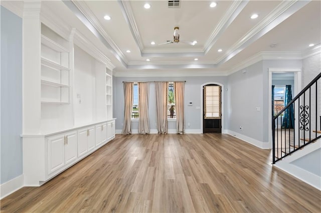 1316 Hickory Ave, Harahan, LA 70123 - unfurnished living room featuring ceiling fan, plenty of natural light, light wood-type flooring, and crown molding