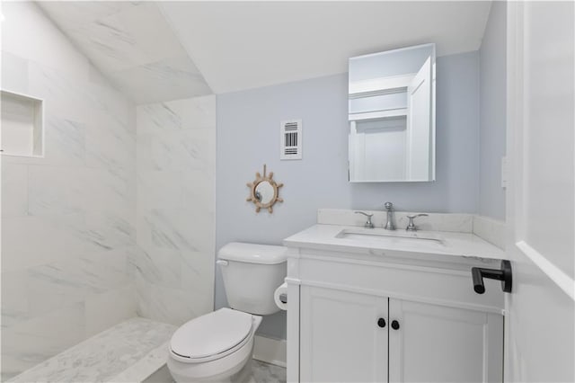 1316 Hickory Ave, Harahan, LA 70123 - full bath featuring vanity, tiled shower, and lofted ceiling