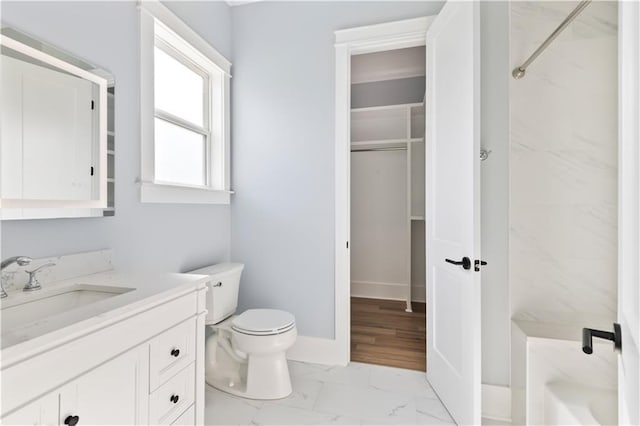 1316 Hickory Ave, Harahan, LA 70123 - bathroom featuring vanity, marble finish floors, and a marble finish shower
