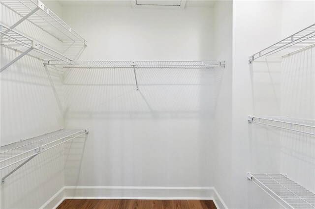 3523 Audubon Trce Unit 3523, Jefferson, LA 70121 - walk in closet featuring wood finished floors