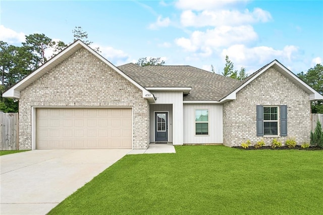 41763 Whisper Woods Rd, Ponchatoula, LA 70454 - view of front facade with brick siding, a shingled roof, driveway, an attached garage, and board and batten siding