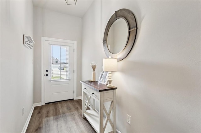 41763 Whisper Woods Rd, Ponchatoula, LA 70454 - doorway featuring wood finished floors and baseboards