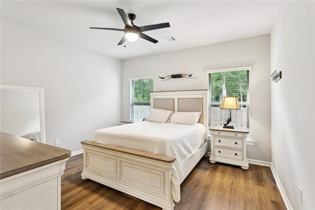 41763 Whisper Woods Rd, Ponchatoula, LA 70454 - bedroom with wood finished floors and a ceiling fan