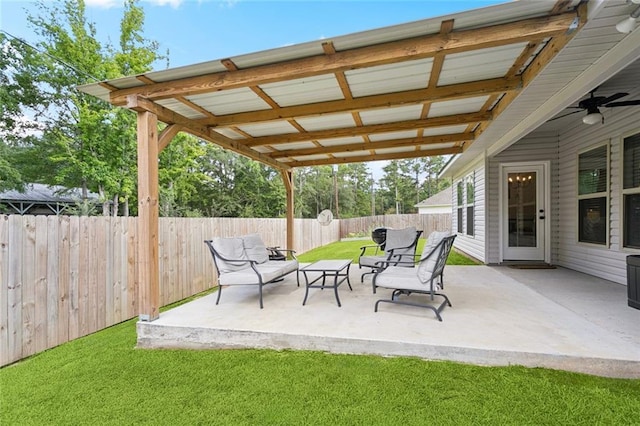 41763 Whisper Woods Rd, Ponchatoula, LA 70454 - fenced backyard with a patio and a ceiling fan