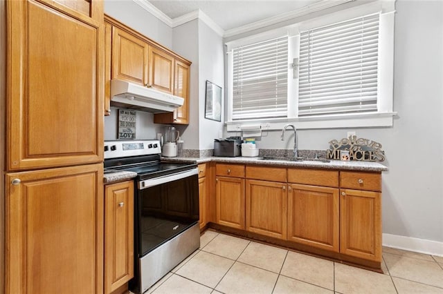 1631 S Salcedo St, New Orleans, LA 70125 - kitchen featuring electric range, under cabinet range hood, ornamental molding, light tile patterned floors, and brown cabinets