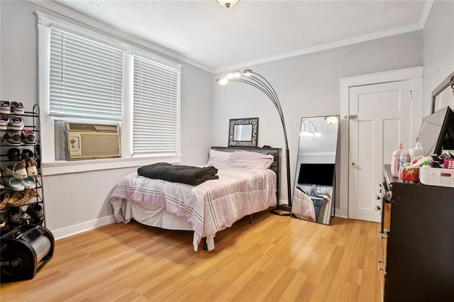 1631 S Salcedo St, New Orleans, LA 70125 - bedroom with ornamental molding, light wood-type flooring, and cooling unit