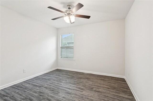 24359 Dawson Ct, Ponchatoula, LA 70454 - spare room with dark wood-type flooring and ceiling fan