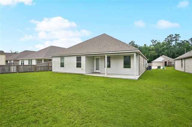 24359 Dawson Ct, Ponchatoula, LA 70454 - rear view of property featuring a patio area and roof with shingles
