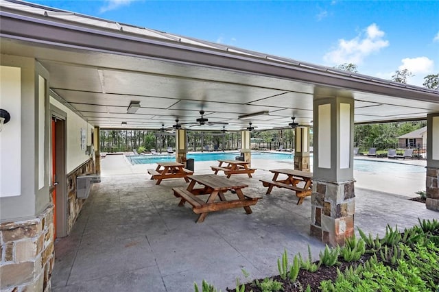 24359 Dawson Ct, Ponchatoula, LA 70454 - view of patio with a community pool and ceiling fan