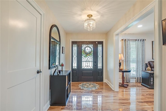 42 Melrose Dr, Destrehan, LA 70047 - entrance foyer with a chandelier and baseboards
