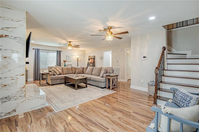42 Melrose Dr, Destrehan, LA 70047 - living area with a ceiling fan, stairway, and recessed lighting