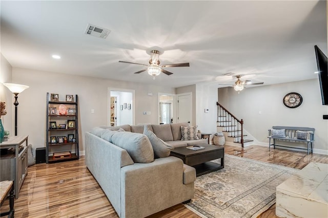 42 Melrose Dr, Destrehan, LA 70047 - living room with ceiling fan, light wood-style flooring, stairs, and recessed lighting