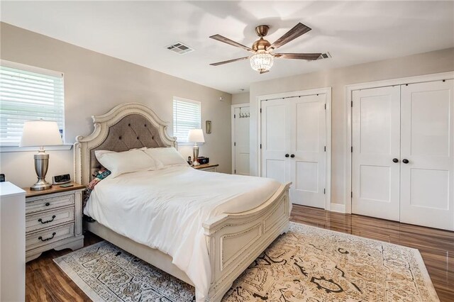 42 Melrose Dr, Destrehan, LA 70047 - bedroom featuring two closets, wood finished floors, and a ceiling fan