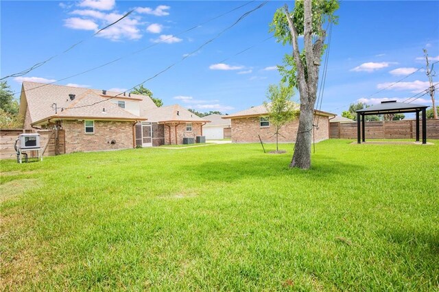 42 Melrose Dr, Destrehan, LA 70047 - view of yard featuring a gazebo and a sunroom