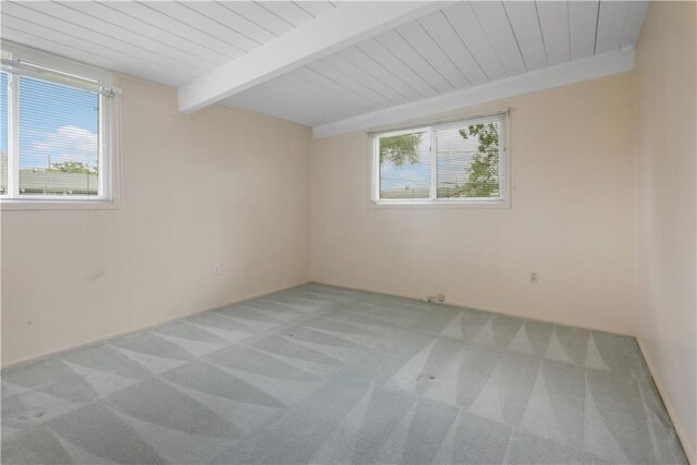 2812 Green Acres Rd, Metairie, LA 70003 - carpeted spare room with a wood ceiling with exposed beams
