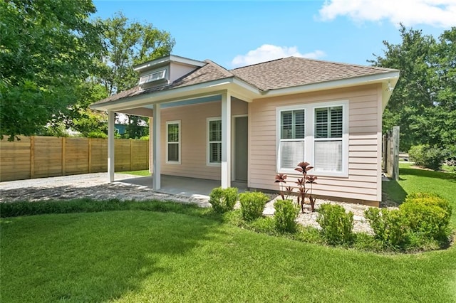 904 W 16th Ave, Covington, LA 70433 - rear view of house with a patio and roof with shingles