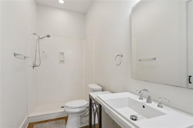 904 W 16th Ave, Covington, LA 70433 - full bathroom featuring a sink and a shower stall