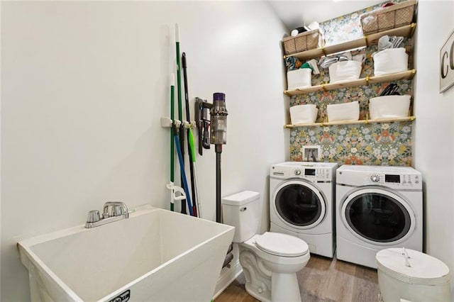 19480 N 3rd St, Covington, LA 70433 - laundry area featuring separate washer and dryer and wood finished floors