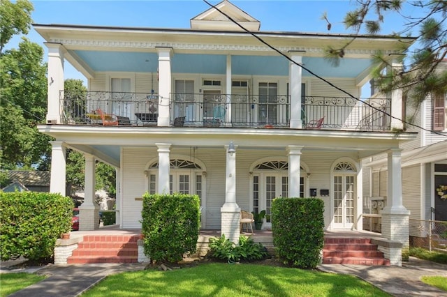 113335 Fern St, New Orleans, LA 70118 - back of house with a balcony, covered porch, and french doors