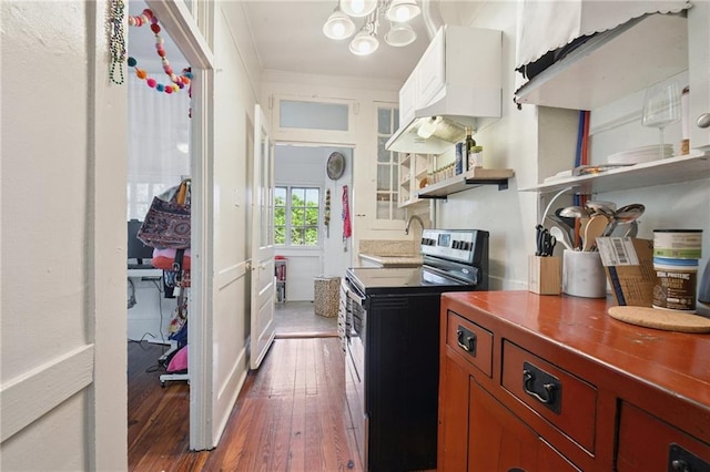 113335 Fern St, New Orleans, LA 70118 - kitchen with electric stove, hardwood / wood-style flooring, open shelves, a chandelier, and crown molding