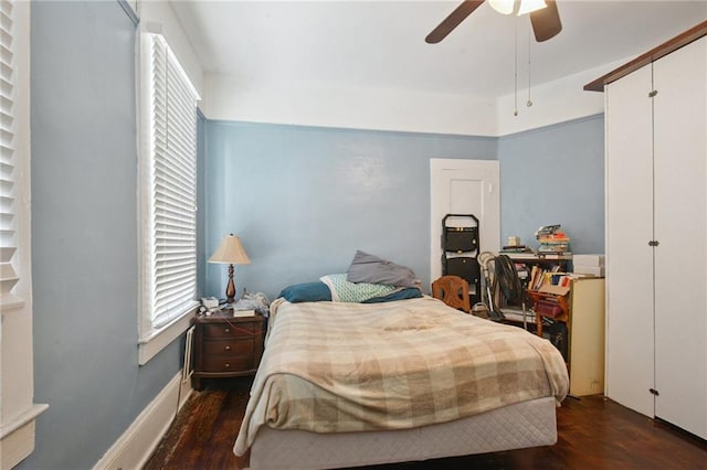 113335 Fern St, New Orleans, LA 70118 - bedroom featuring wood finished floors, multiple windows, and ceiling fan