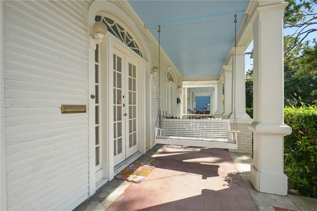 113335 Fern St, New Orleans, LA 70118 - porch featuring french doors