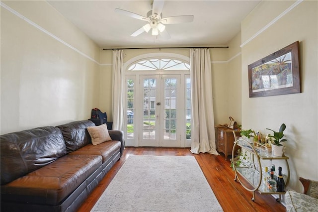 113335 Fern St, New Orleans, LA 70118 - living room with french doors, wood finished floors, and a ceiling fan