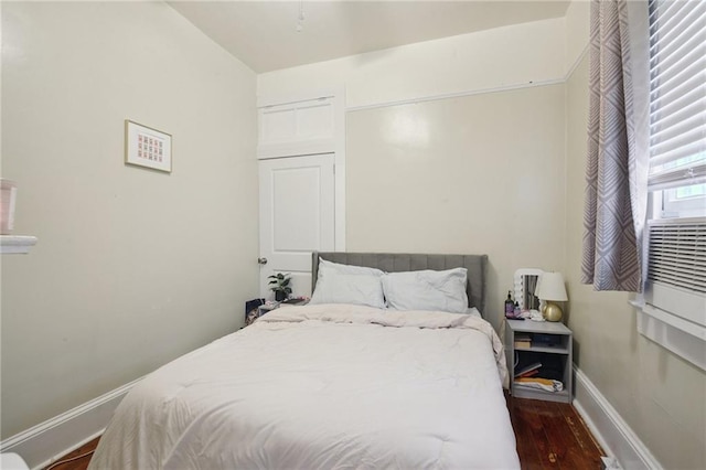 113335 Fern St, New Orleans, LA 70118 - bedroom with wood finished floors and baseboards