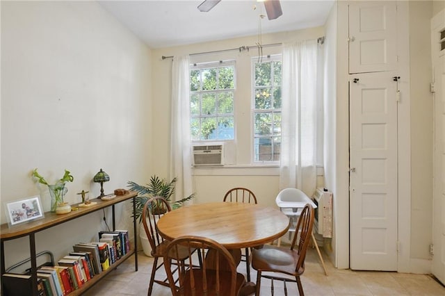 113335 Fern St, New Orleans, LA 70118 - dining area with a ceiling fan, light tile patterned floors, and cooling unit