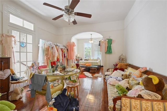 113335 Fern St, New Orleans, LA 70118 - living room with hardwood / wood-style flooring, a ceiling fan, and arched walkways
