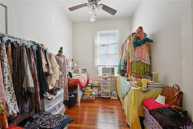 113335 Fern St, New Orleans, LA 70118 - interior space featuring cooling unit, ceiling fan, and wood-type flooring