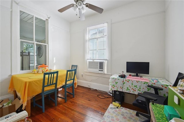 113335 Fern St, New Orleans, LA 70118 - office space featuring stacked washer / dryer, wood finished floors, and ceiling fan
