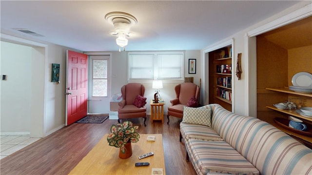 3229 Hero Dr, Gretna, LA 70053 - living area with wood finished floors