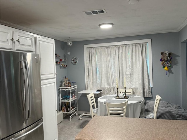 517 Colony Pl, Metairie, LA 70003 - dining room featuring ornamental molding and baseboards