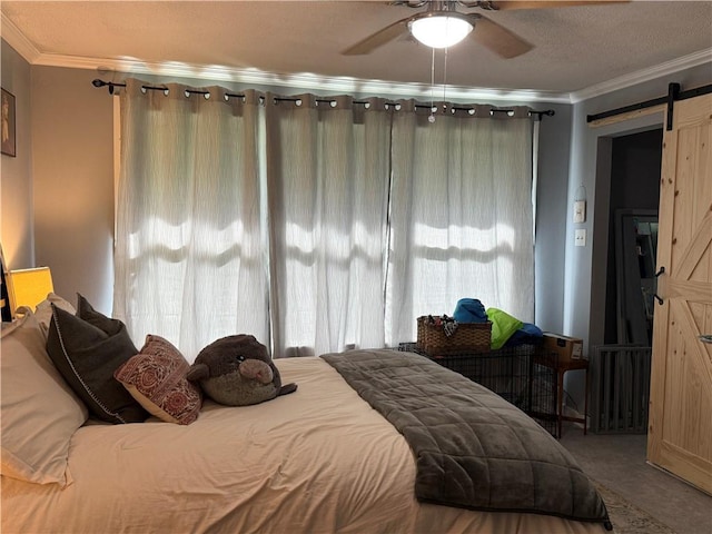 517 Colony Pl, Metairie, LA 70003 - bedroom featuring a barn door, crown molding, and ceiling fan