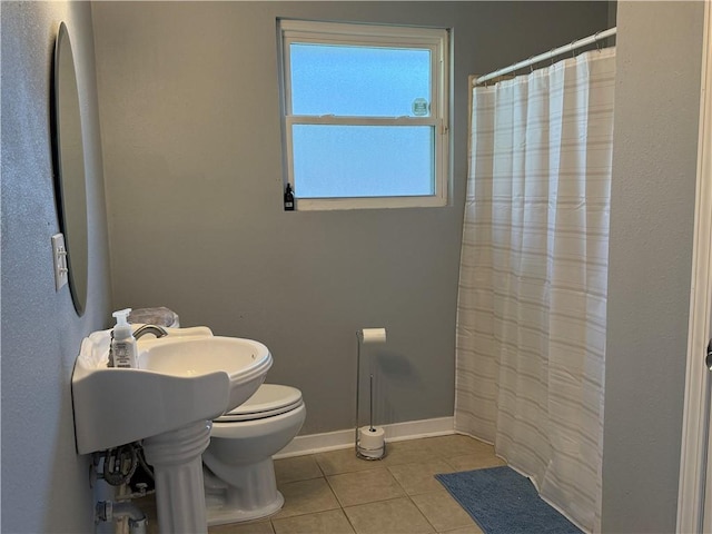 517 Colony Pl, Metairie, LA 70003 - full bath with tile patterned floors and a shower with shower curtain