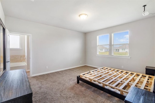 7542 1ST Lake Dr, Slidell, LA 70461 - unfurnished bedroom with carpet flooring and connected bathroom