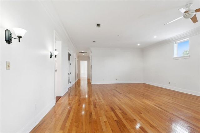 8416 Oak St Unit K, New Orleans, LA 70118 - empty room featuring light wood-type flooring, crown molding, ceiling fan, and recessed lighting