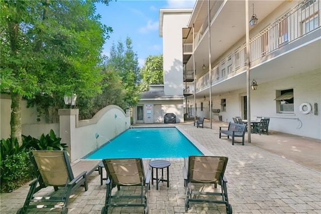 8416 Oak St Unit K, New Orleans, LA 70118 - community pool featuring a patio area