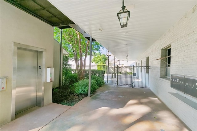 8416 Oak St Unit K, New Orleans, LA 70118 - view of patio with elevator