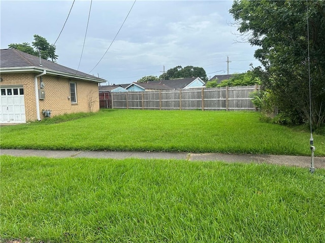 3822 Leila Pl, Jefferson, LA 70121 - view of yard with an attached garage