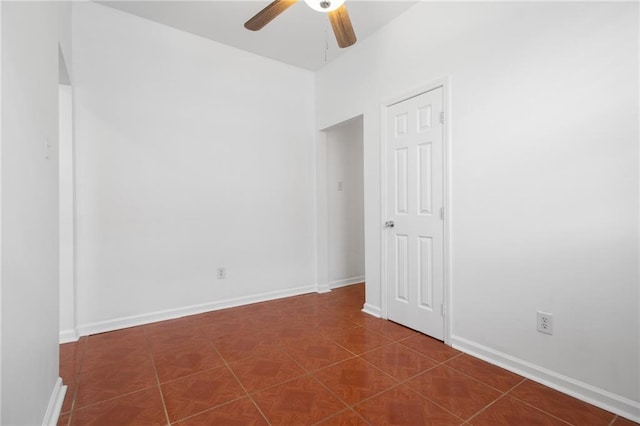 2446 N Rocheblave St, New Orleans, LA 70117 - empty room featuring a ceiling fan and baseboards