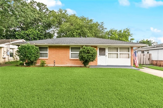 508 Arnold Ave, River Ridge, LA 70123 - single story home with brick siding, driveway, and roof with shingles