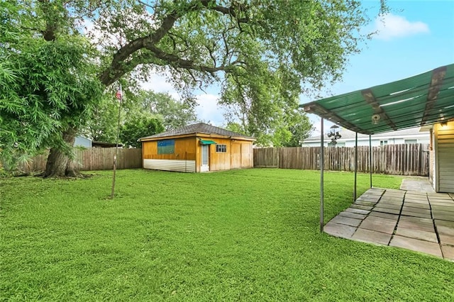 508 Arnold Ave, River Ridge, LA 70123 - fenced backyard featuring an outdoor structure and a patio