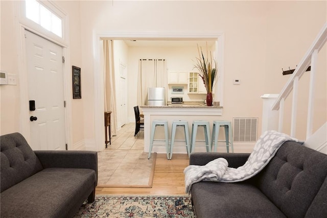 152729 Dumaine St, New Orleans, LA 70116 - entrance foyer with stairs and light wood-type flooring