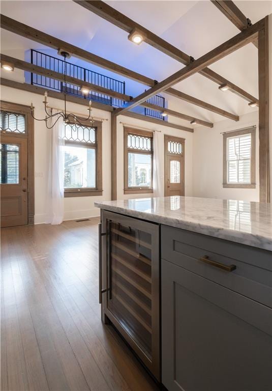 623-25 Louisa St, New Orleans, LA 70117 - bar area with beverage cooler, beam ceiling, and dark wood-style floors