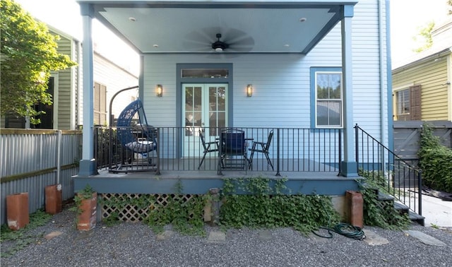 623-25 Louisa St, New Orleans, LA 70117 - rear view of property with ceiling fan and a porch