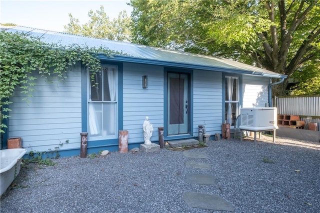 623-25 Louisa St, New Orleans, LA 70117 - view of front facade with a metal roof